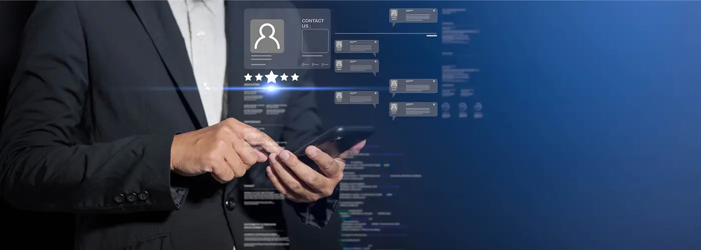 Person in black suit interacting with smartphone displaying digital contact and rating interface.